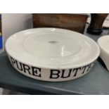 A LARGE 'PURE BUTTER' STONEWARE SHOP DISPLAY PLATE MARKED 'WEIGHWELL SERVICE', BERRY AND