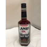 A 700 ML BOTTLE OF IMPORTED LAMB'S GENUINE NAVY RUM - A SMOOTH AND MELLOW QUALITY RUM FROM THE