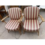 A PAIR OF ERCOL SPINDLE BACK FIRESIDE CHAIRS