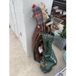 TWO GOLF CLUB BAGS WITH VARIOUS CLUBS