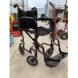 A FOLDING WHEEL CHAIR