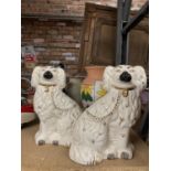 A PAIR OF STAFFORDSHIRE MANTLE DOGS