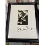 A SIGNED PICTURE OF JOHN WILLIAMS GUITARIST