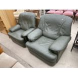 A PAIR OF GREEN FAUX LEATHER EASY CHAIRS