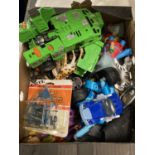 A BOX OF CARS TOGETHER WITH OTHER ITEMS SUCH AS PLASTIC ANIMALS, HANDCUFFS, PENDLEFIN RABBITS ETC