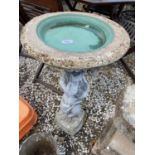 A RECONSTITUTED STONE BIRD BATH