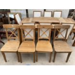 A SET OF FOUR MODERN PINE DINING CHAIRS WITH X-FRAME BACKS