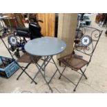 A METAL FOLDING BISTRO SET COMPRISING OF A ROUND TABLE AND TWO CHAIRS