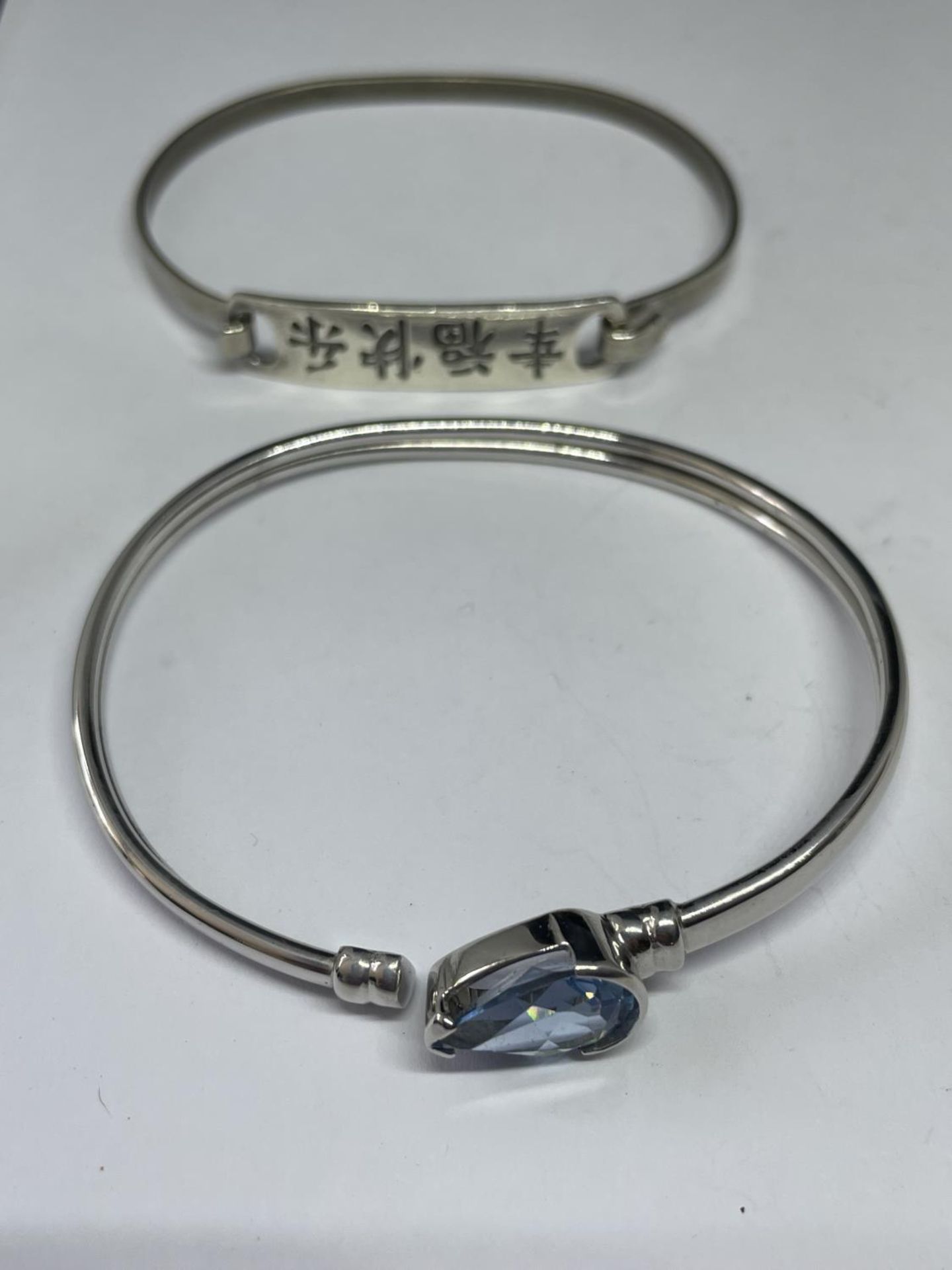 FOUR VARIOUS MARKED SILVER BANGLES - Image 2 of 3