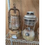 A VINTAGE PARAFIN TILLY LAMP AND A FURTHER SANDSTAR OIL LAMP