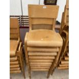 A SET OF NINE TECTA LTD BENTWOOD STACKING CHAIRS