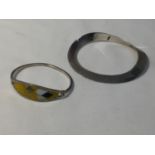 TWO SILVER BANGLES ONE MARKED AND WITH AN ENAMEL DESIGN
