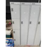 A METAL LOCKER CABINET WITH KEY