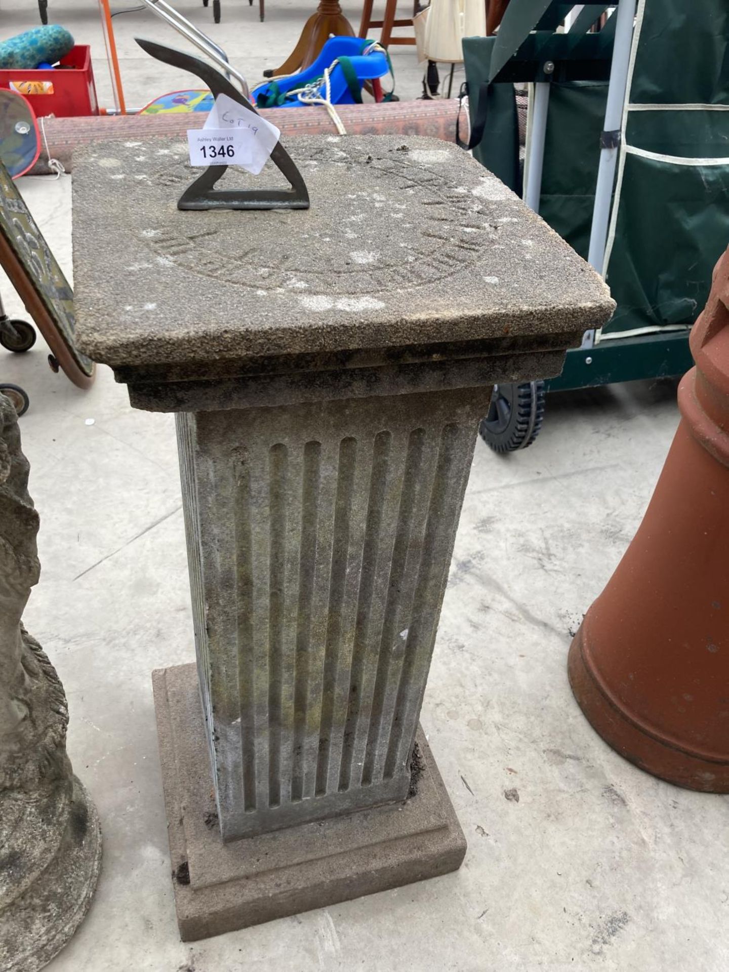 A RECONSTITUTED STONE SUNDIAL