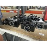 A LARGE COLLECTION OF CAMERAS TO INCLUDE PENTAX, PRAKTICA, ZENITH ETC