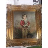 A BRUSHED LACQUERED PRINT OF A BOY HOLDING A DOG IN A GILT FRAME 41CM X 46CM