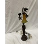 A TABLE LAMP WITH A RESIN LADY BASE AND A FLORAL SHADE HEIGHT 64CM