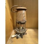 A VINTAGE MINERS LAMP