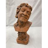 A TERRACOTTA STONE BUST OF 'LAUGHING PAN' HEIGHT 45CM