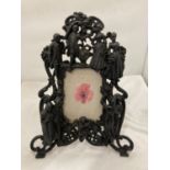 A HEAVY CAST VINTAGE PHOTO FRAME WITH CHERUB AND FIGURE DECORATION HEIGHT 36CM