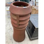 A TERRACOTTA CHIMNEY POT