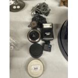 A QUANTITY OF CAMERA ACCESORIES TO INCLUDE LENSES, FLASH, A ROLL OF LEAD, SHORTWAVE REEL ANTENNA,