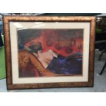 A FRAMED PRINT OF A LADY ON A CHAISE LONGE