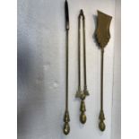A BRASS COMPANION SET TO INCLUDE POKER, TONGS AND SHOVEL