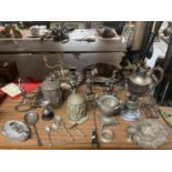 A QUANTITY OF SILVER PLATED ITEMS TO INCLUDE CANDLESTICKS, ORNATE LIDDED POTS, SPOONS, TRAY,