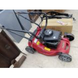 A MOUNTFILED PETROL MOWER (NO GRASS BOX)