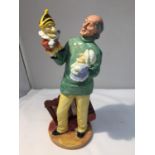 A ROYAL DOULTON FIGURE 'PUNCH AND JUDY MAN' HN 2765 HEIGHT APPROX 23CM