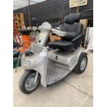 A TGA BREEZE THREE WHEELED MOBILITY SCOOTER KEY IN OFFICE. VENDOR STATES IN WORKING ORDER BUT NO