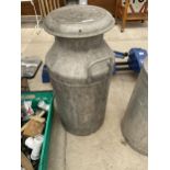 A VINTAGE MILK CHURN