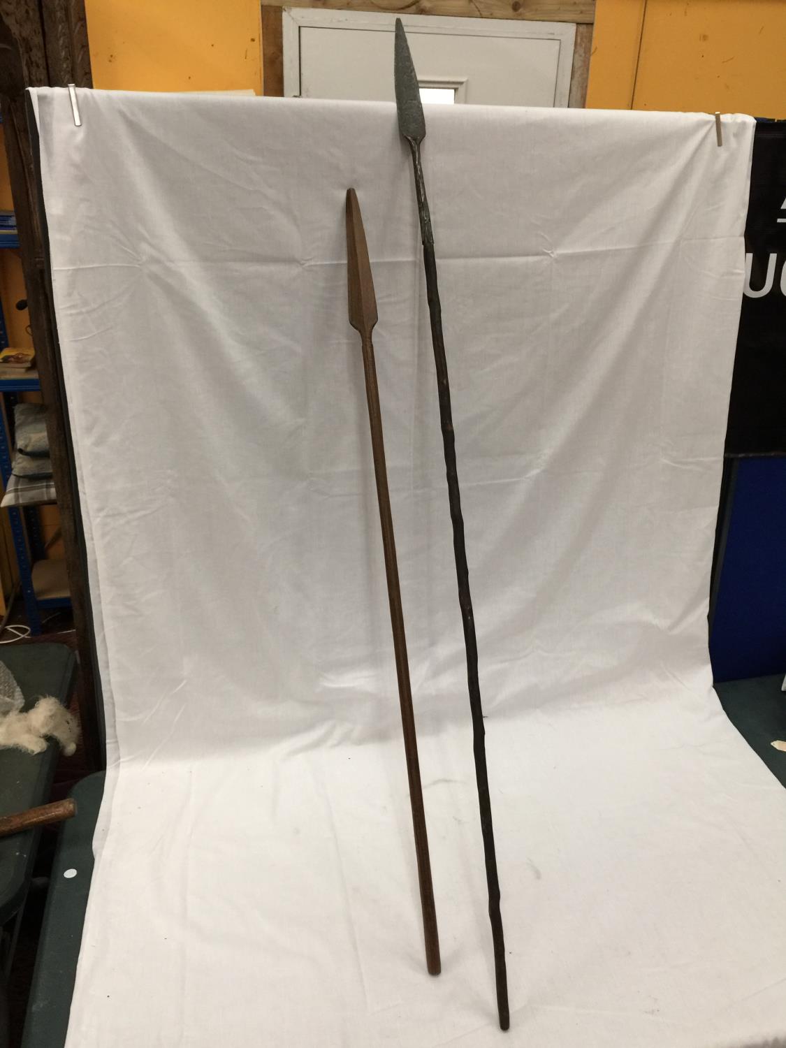 A VINTAGE 'HUNTING' SPEAR WITH METAL TIP LENGTH 150CM AND A WOODEN SPEAR LENGTH 118CM