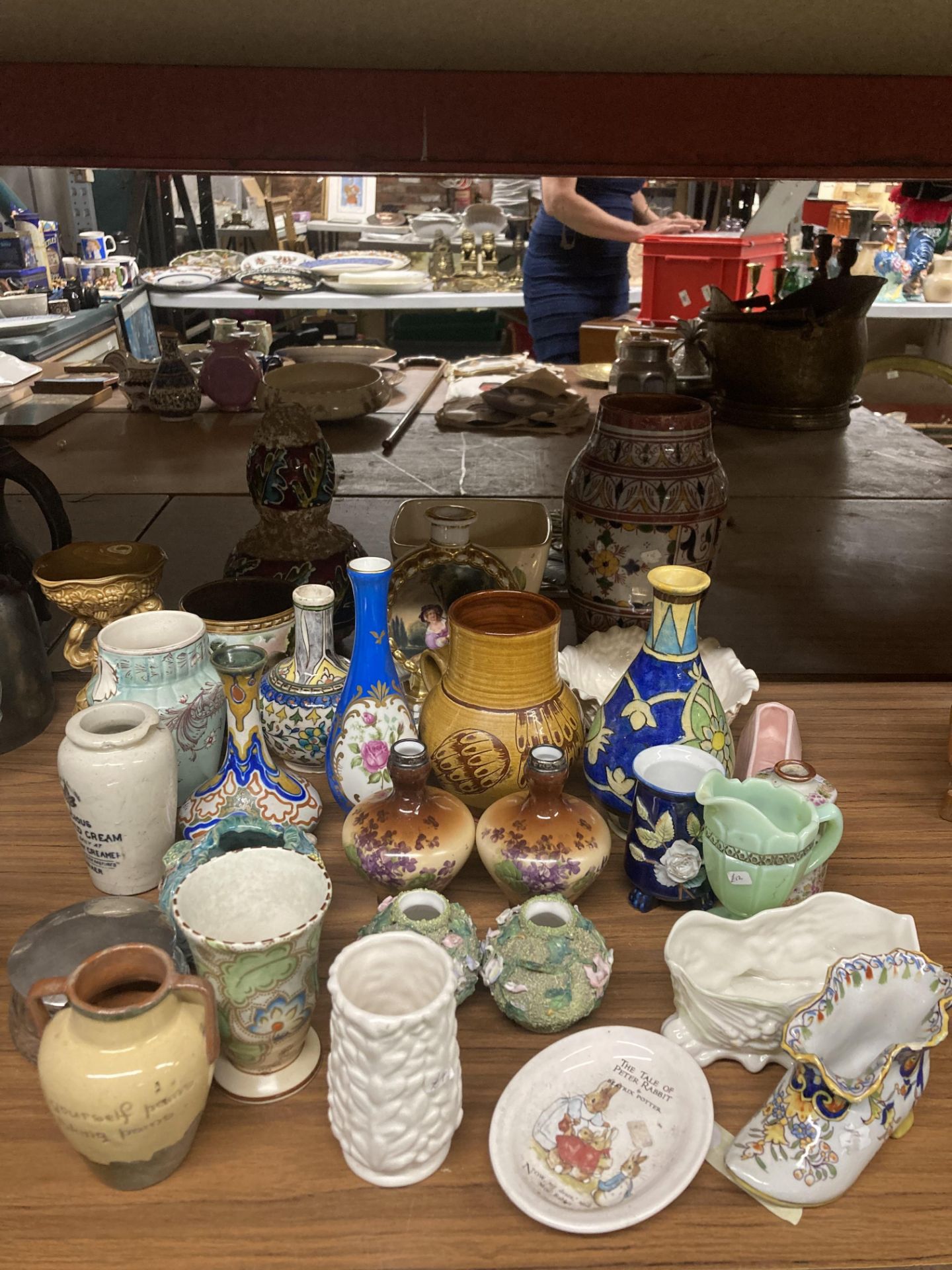 A LARGE QUANTITY OF CERAMICS TO INCLUDE VASES, PLANTERS, ETC