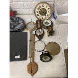 A QUANTITY OF CLOCK PARTS TO INCLUDE FACES, GLASS, A MOVEMENT, BAROMETER, ETC