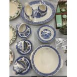 A QUANTITY OF EMPIRE 'OLD WILLOW' PATTERN TO INCLUDE CUPS, SAUCERS, BOWLS, SERVING PLATE SAUCE JUGS,