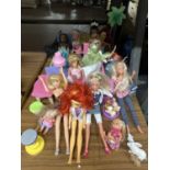 A QUANTITY OF DOLLS AND ACCESORIES TO INCLUDE DISNEY