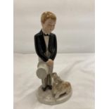 A VINTAGE GOLDSCHEIDER FIGURE OF A BOY WITH A DOG - A/F BOYS LEGS CRACKED