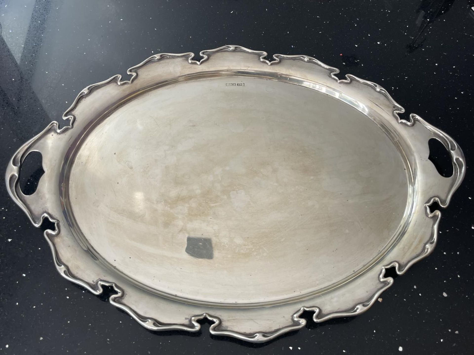 A LARGE HALLMARKED LONDON SILVER TWIN HANDLED TRAY L:57.5CM W:42.5CM GROSS WEIGHT 2374 GRAMS