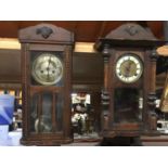 TWO OAK CASED WALL CLOCKS