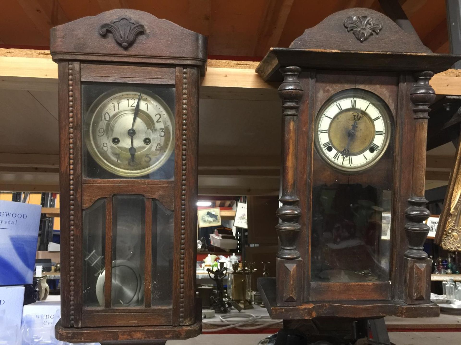 TWO OAK CASED WALL CLOCKS