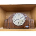 A WALNUT CASED NAPOLEON HAT CLOCK