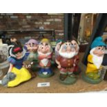 A COLLECTABLE DISNEY SET OF SNOW WHITE AND THE SEVEN DWARFS