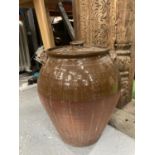 A LARGE CERAMIC LIDDED POT HEIGHT 45CM