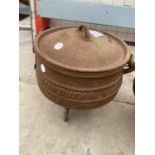 A VINTAGE CAST IRON BEST DUTY LIDDED COOKING POT