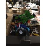 A BOX OF CARS TOGETHER WITH OTHER ITEMS SUCH AS TOY ANIMALS, HANDCUFFS, PENDLEFIN RABBITS ETC