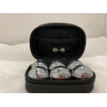 A SMALL SET OF BOULES IN CASE