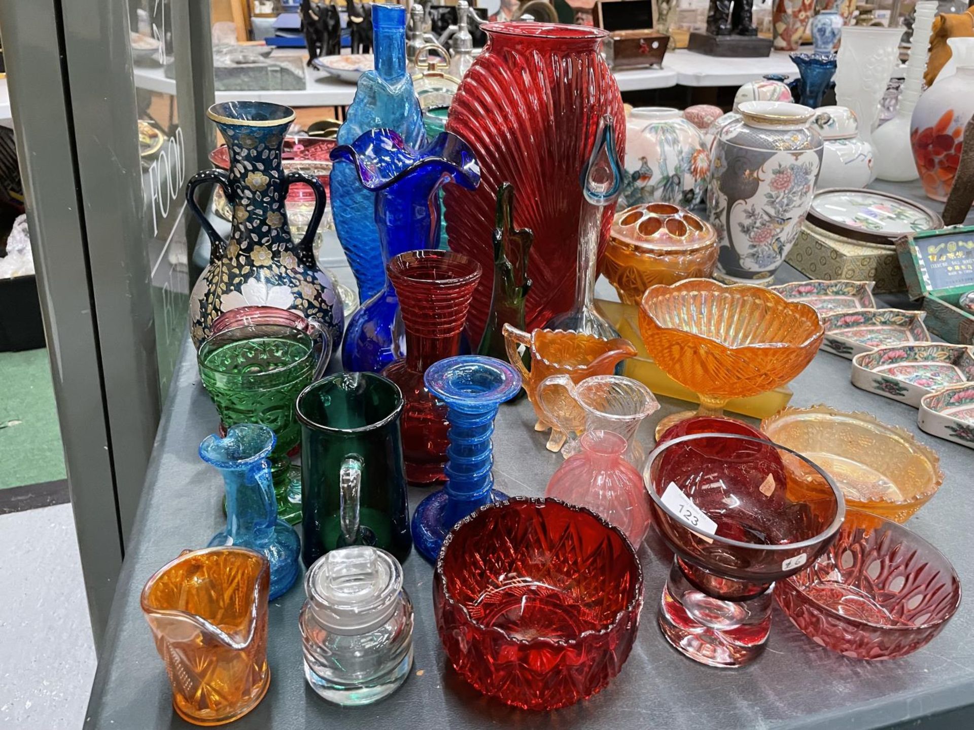 A LARGE QUANTITY OF COLOURED GLASSWARE TO INCLUDE VASES, BOWLS, JUGS, ETC