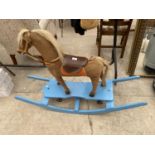 A VINTAGE ROCKING HORSE